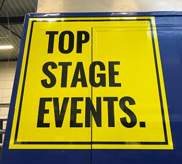 Top Stage Events - Belettering podiumwagen